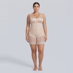 Model wearing the nude V-Lock shaping bodysuit, front view